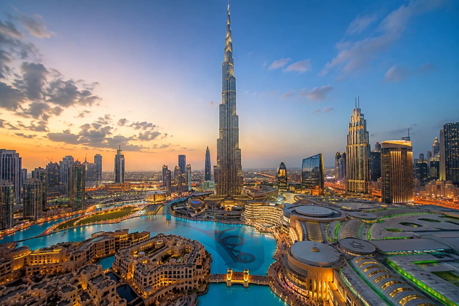 Burj Khalifa dominating the Dubai skyline at sunset