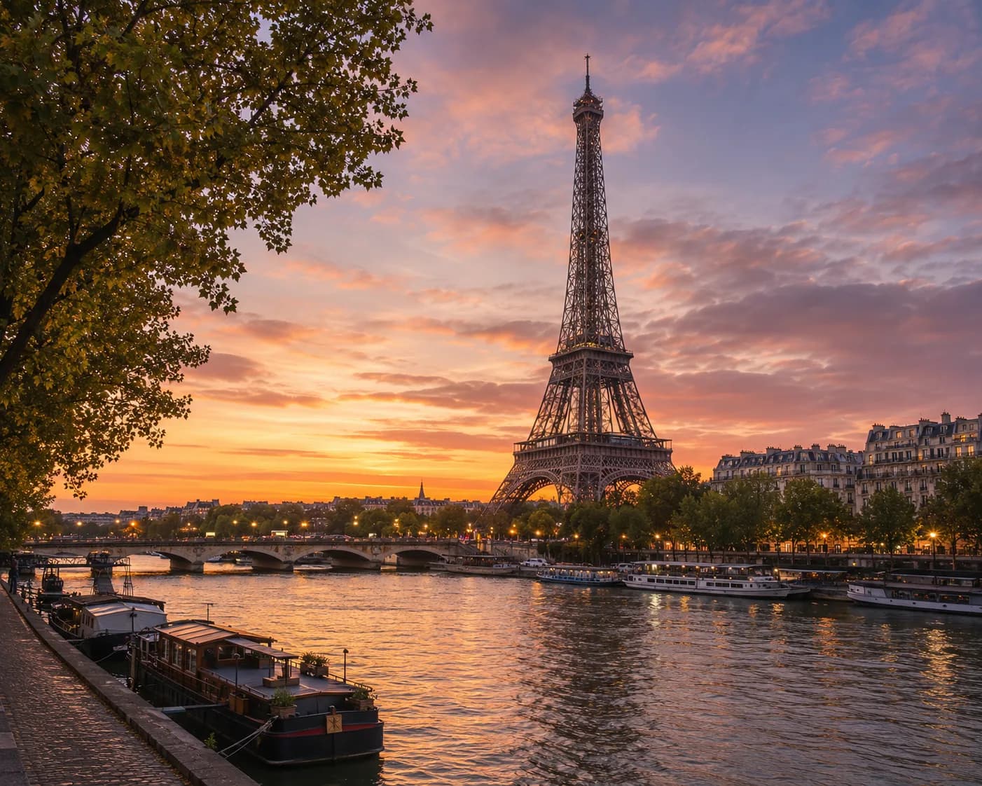 Eiffel Tower and Parisian rooftops at sunset